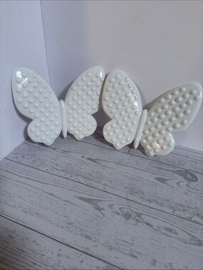 Decorative White hobnail butterflies. By Burwood